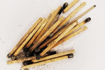 bunch of matchsticks on white background